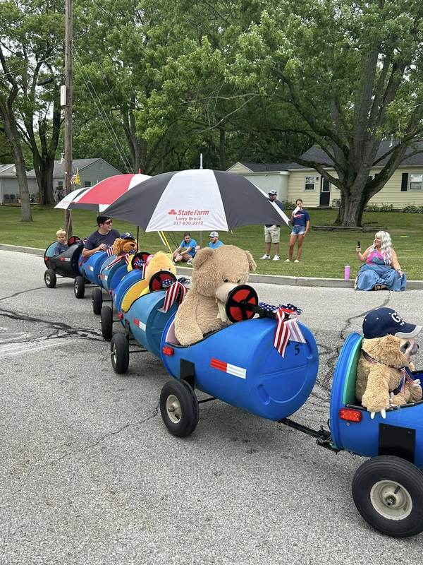 Barrel train ride full of patriotic teddy bears