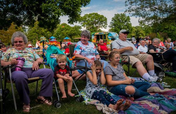 Families watching from the lawn